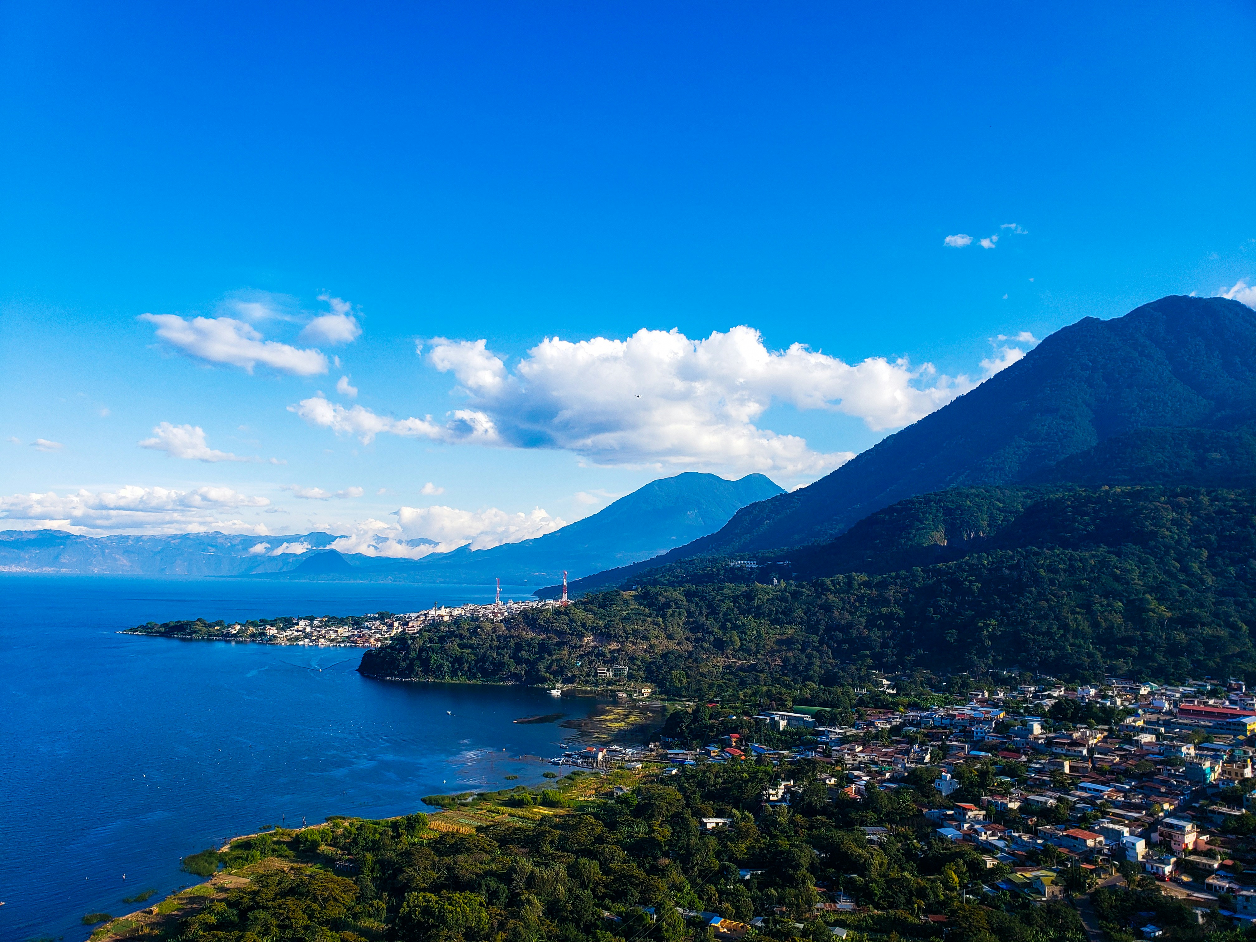 Lake Atitlán and the surrounding mountains and communities in Guatemala